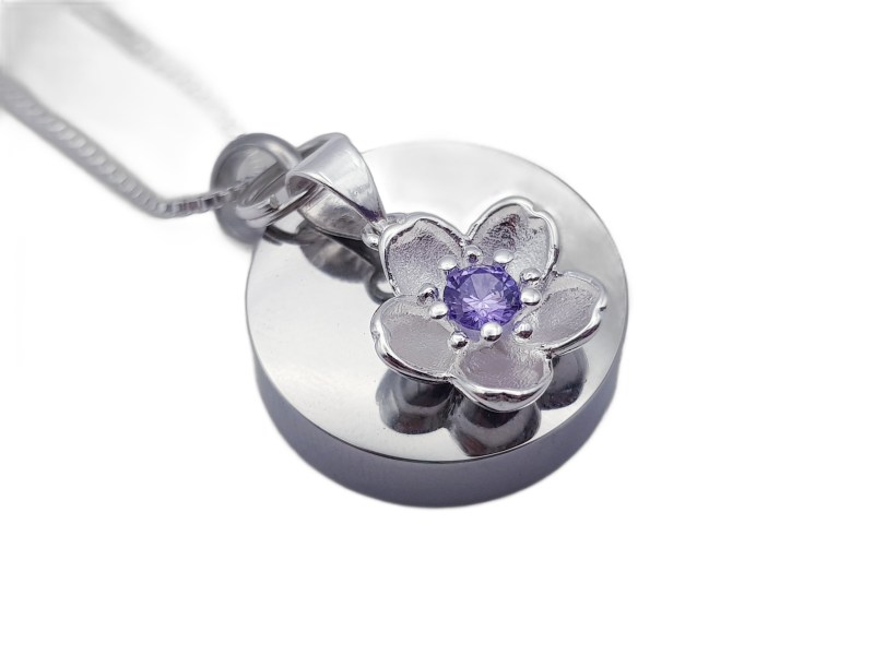 Ascheschmuck Medaillon mit 925 Sterling Silber Blume mit violettem Kristall.